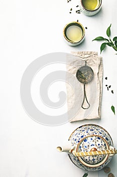 Tea composition on grey background, flat lay