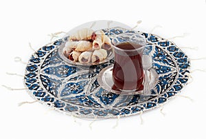 Tea and cookies, served on the qalamkar platemat.