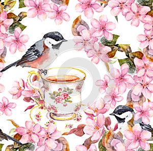 Tea cup, birds and flowers. Seamless floral pattern. Aquarelle drawing on white background