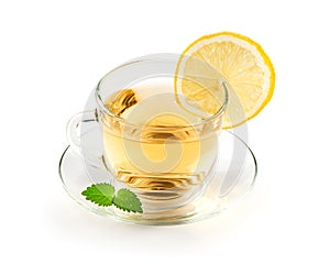 Tea in cup with leaf mint and lemon