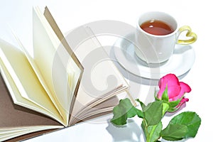 Tea cup of love , handmade book and pink rose