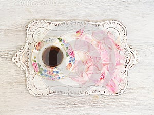 Tea cup with peony petals