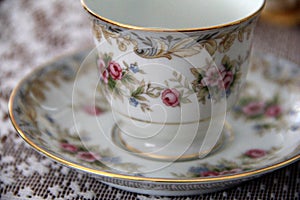 Tea cup and saucer on lace