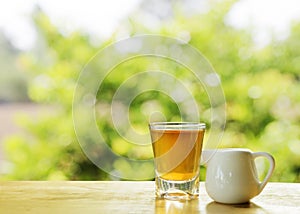 Tea drinks with nature tree bokeh sunlights backgrounds