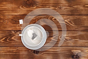 Tea Cup on a saucer with a tea bag