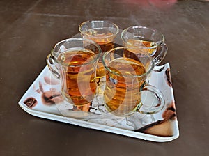 Tea Glass refresing brown four photo