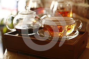 Tea in glass teacup photo