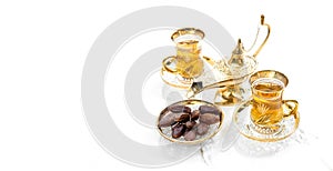 Tea glasses golden lantern decoration Oriental hospitality Ramadan kareem photo