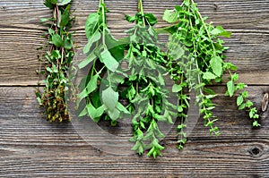 Tea herbs wood background