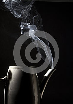 Tea kettle with boiling water