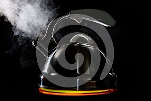 Tea kettle with boiling water
