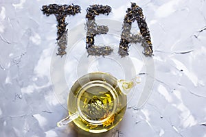 `Tea` is laid out from dry tea leaves