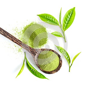 Tea leaf and matcha green tea powder in wood spoon isolated on white background