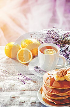 Tea with lemon in a cozy atmosphere.