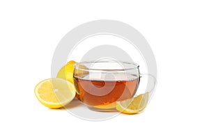 Tea and lemon slices isolated on background