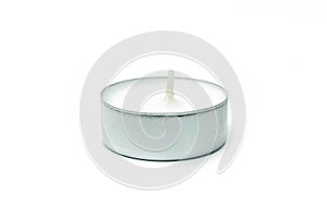 Tea light candle on white background