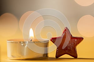 tea-light and red star