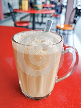 Tea with milk or popularly known as Teh Tarik in Malaysia