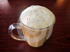 Tea with milk or popularly known as Teh Tarik in Malaysia