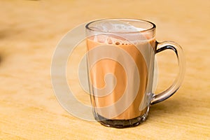 Tea with milk or popularly known as Teh Tarik in Malaysia photo