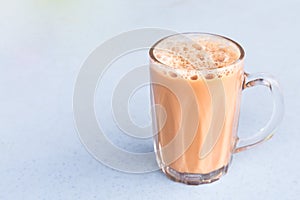 Tea with milk or popularly known as Teh Tarik in Malaysia