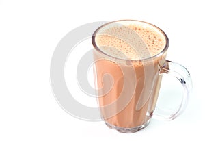 Tea with milk or popularly known as Teh Tarik over white background