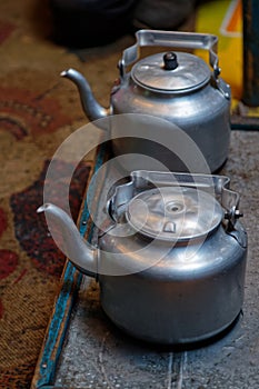 Tea pot boiling in the yurt