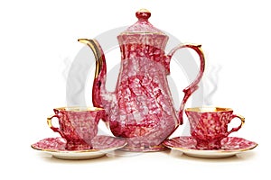 Tea pot and cups isolated