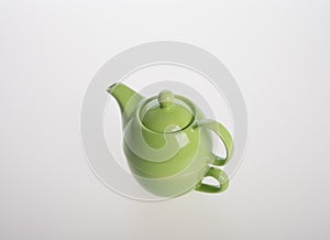 Tea pot set or Porcelain tea pot and cup on background.