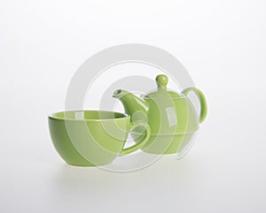 Tea pot set or Porcelain tea pot and cup on background.