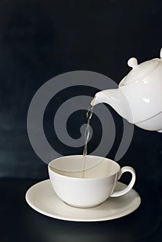 Tea pouring from china pot