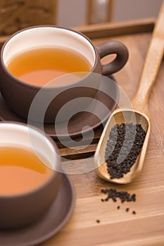 Tea serving in brown cups