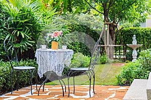 A Tea set on The Table in The Garden At Afternoon.