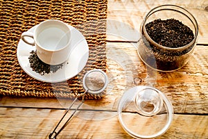 Tea set on the wooden background top view