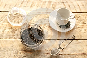 Tea set on the wooden background top view