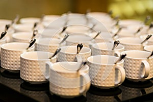 Tea sets, collection white coffee cups, buffet, catering