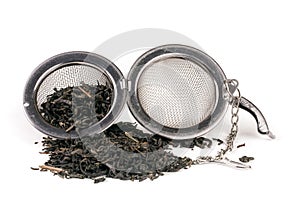 Tea strainer on a chain isolated white background