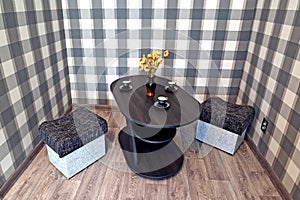 Tea table and two poufs in the living room