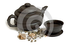 Tea, teapot, cup and sugar