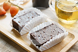 Tea Time . blueberry cake and Chinese Tea on wooden background.