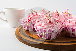 Tea time with pink cupcakes