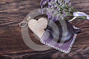 Tea time on wooden background