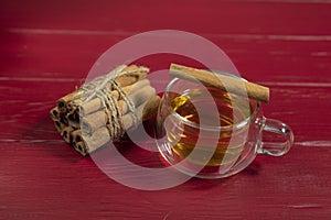 Tea in a transparent cup on the table