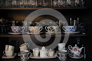 Tea utensils, coffee and beverages on the shelves