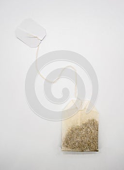 Teabag with white label on white
