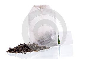 Teabag with white label and tea loose