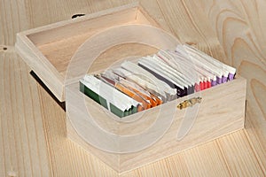 Teabags in wooden box photo