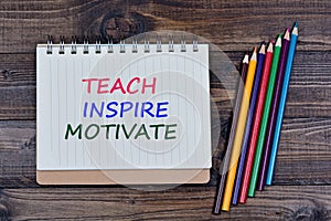 Teach Inspire Motivate on notebook