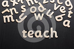 Teach in Wooden Letters