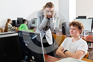 Teacher amazed by misbehavior of teenage boy during computer science lesson